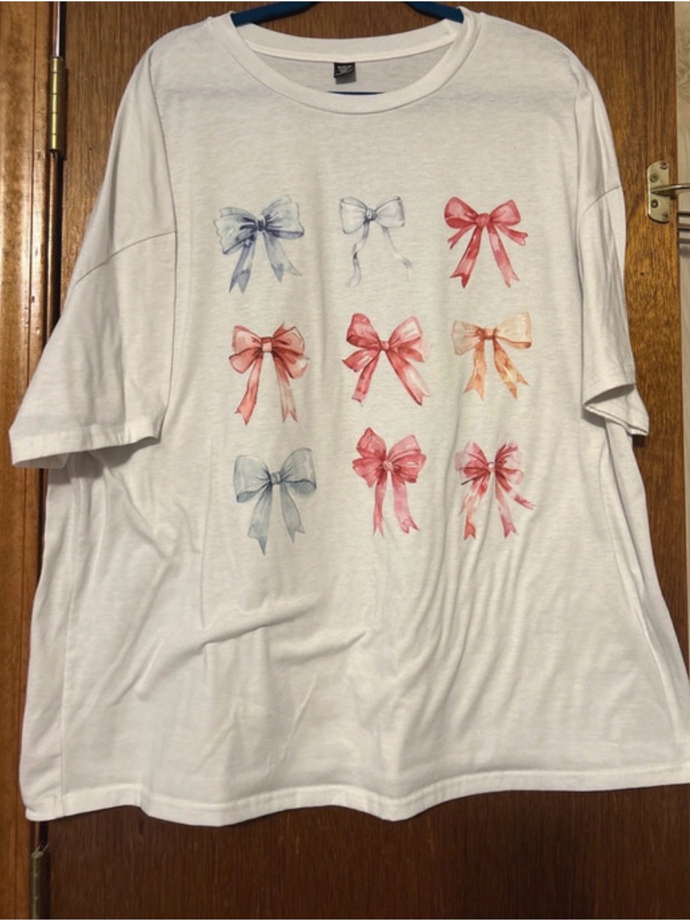 SHEIN White Tee with Pink, Blue and Peach Bow Prints